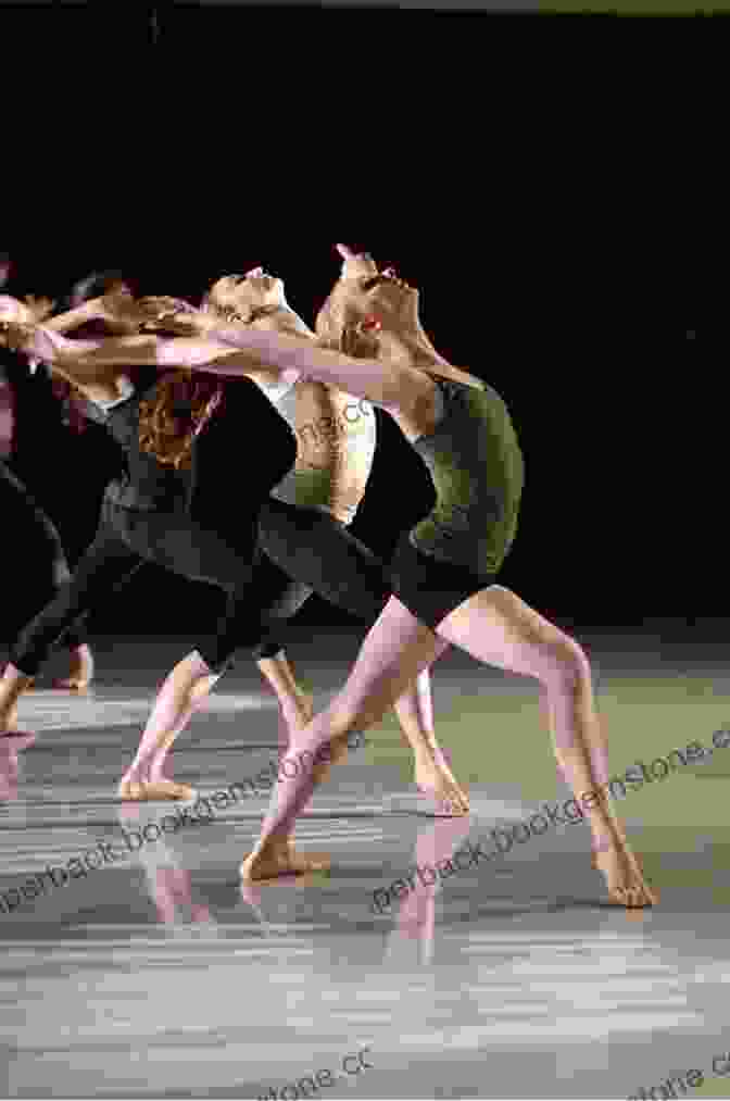 A Group Of Dancers Performing A Contemporary Choreography, Their Bodies Intertwined In A Graceful And Expressive Embrace. The Intimate Act Of Choreography
