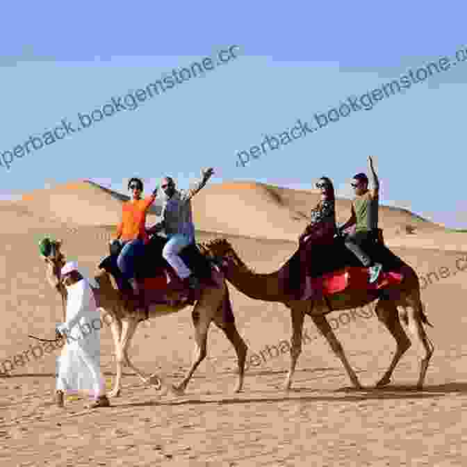 A Group Of Saudi Arabian Men Riding Camels Through The Desert. Crossing The Kingdom: Portraits Of Saudi Arabia