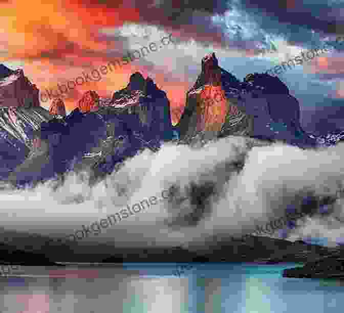 A Panoramic View Of The Majestic Patagonia Mountains, Their Peaks Piercing The Azure Sky. Bridges (Our Earth Collection) John Seed