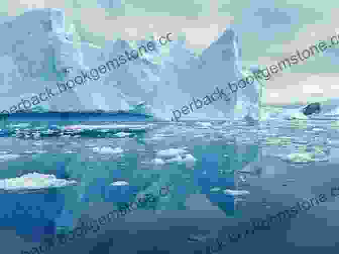 A Stunning Landscape Of Antarctica, With Icebergs Floating In The Water And Mountains In The Background. Antarctica Becomes Her: A Photo Essay (Extreme Latitude 1)