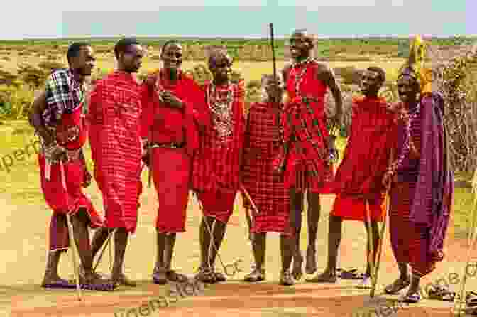 A Vibrant Photograph Of A Traditional Maasai Dance, Their Colorful Attire And Energetic Movements Against A Backdrop Of Golden Savanna. Bridges (Our Earth Collection) John Seed