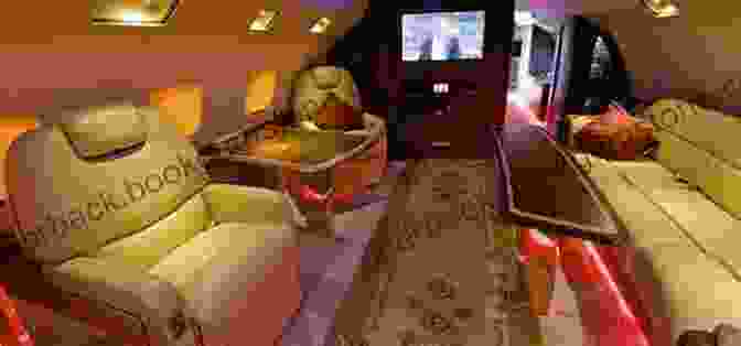 The Luxurious Interior Of A Private Jet, Featuring Leather Seats, Wood Paneling, And A Flat Screen Television. I Ll Drink To That: A Life In Style With A Twist